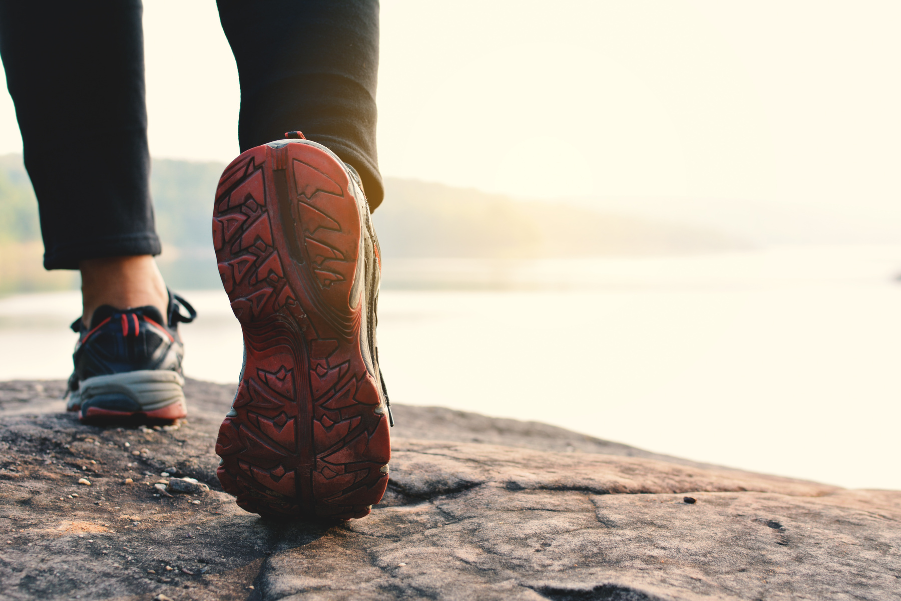 Feet women walking in nature background,concept exercise